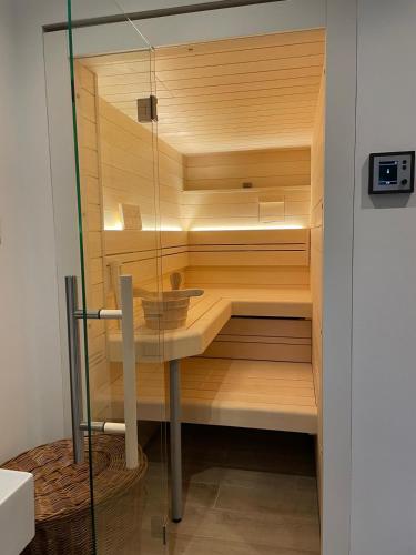 a sauna is shown with a glass door at Ihre Auszeit am See in Lychen