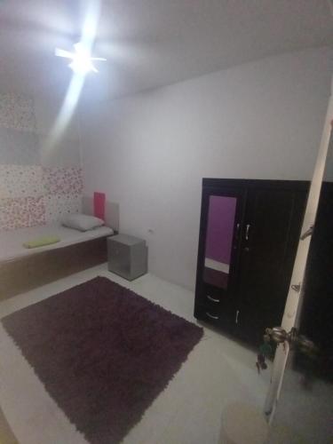 Una cama o camas en una habitación de Turismo comunitario en Cali