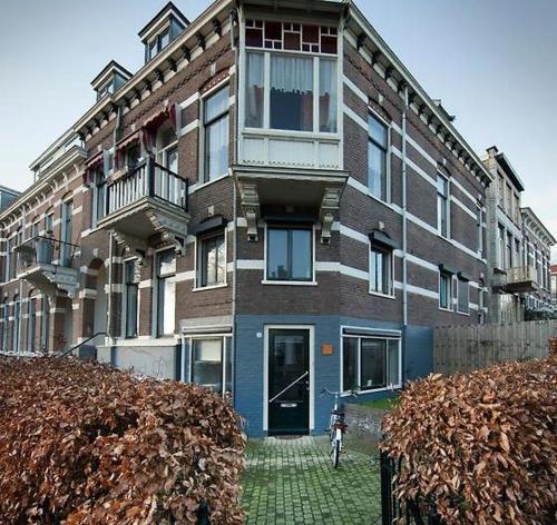a building with a bike parked in front of it at Arnhem Cosy center appartment in Arnhem