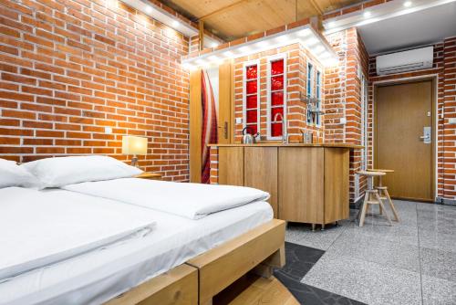 Posteľ alebo postele v izbe v ubytovaní Krowoderska Apartments