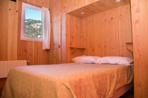 Cama ou camas em um quarto em Sherpa Hostel