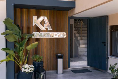 a entrance to a store with a sign on the door at kassandrinos apartments apostolos in Nikiti