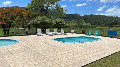 Kolam renang di atau dekat dengan Morada do Campo