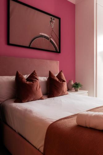 Letto o letti in una camera di Devonshire Terrace Studios
