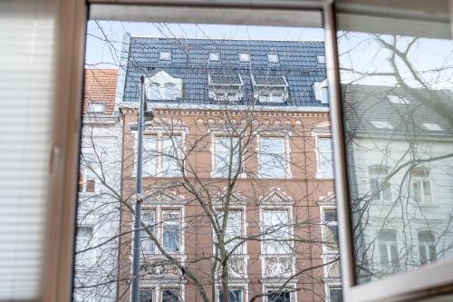 a view of a large building from a window at Urban Retreat Apartment - Whirpool - Top Lage in Cologne