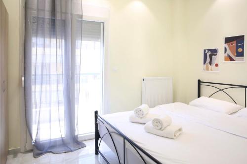 Postel nebo postele na pokoji v ubytování #6 Ioannas Apartments