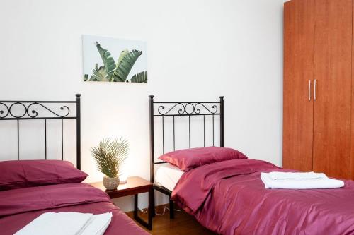 Postel nebo postele na pokoji v ubytování The Attico - Chick Urban - Free Parking