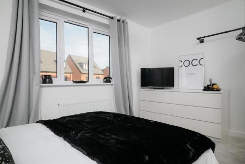 Ein Bett oder Betten in einem Zimmer der Unterkunft Stowe Hideout
