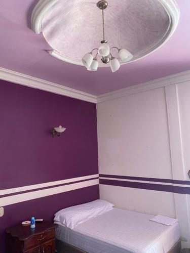 Una cama o camas en una habitación de Madre Casa