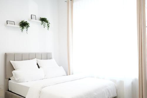 Posteľ alebo postele v izbe v ubytovaní Design Wohnung nahe dem Zentrum