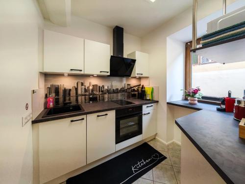 Kuchyň nebo kuchyňský kout v ubytování Wolf Apartments-Spittal