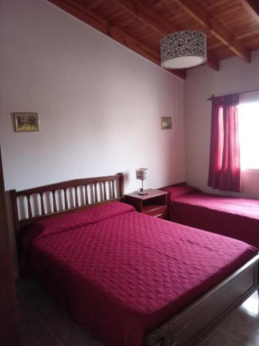 Postel nebo postele na pokoji v ubytování La Rosa