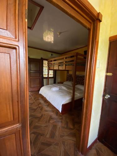 a bedroom with a bunk bed in a room at Valles of Osa in Palmar Sur