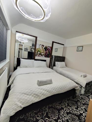 Ein Bett oder Betten in einem Zimmer der Unterkunft Clayton Home