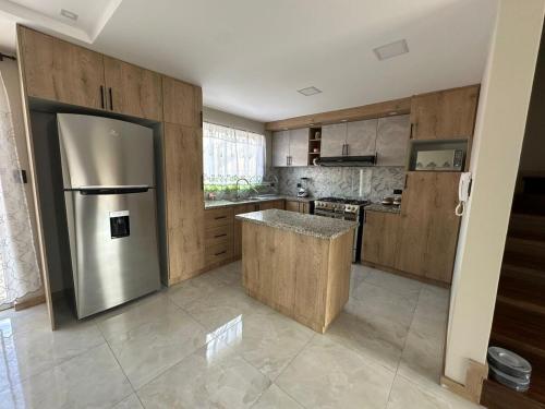 Η κουζίνα ή μικρή κουζίνα στο Casa nueva, acogedora, ideal para familias