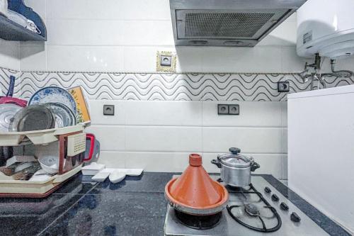 Kuchyň nebo kuchyňský kout v ubytování Spacious Apartment in Agadir, 75 sqm with Private Garden