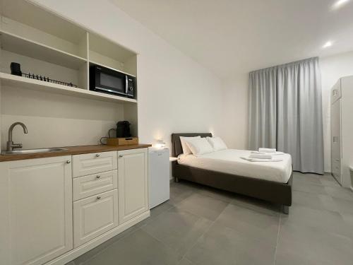 Postel nebo postele na pokoji v ubytování B&B Stazione Nord