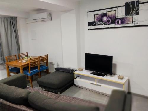 Μια τηλεόραση ή/και κέντρο ψυχαγωγίας στο Nueva Casa Calinera 2025 Buñol centro Todas las Comodidades Full Amenities
