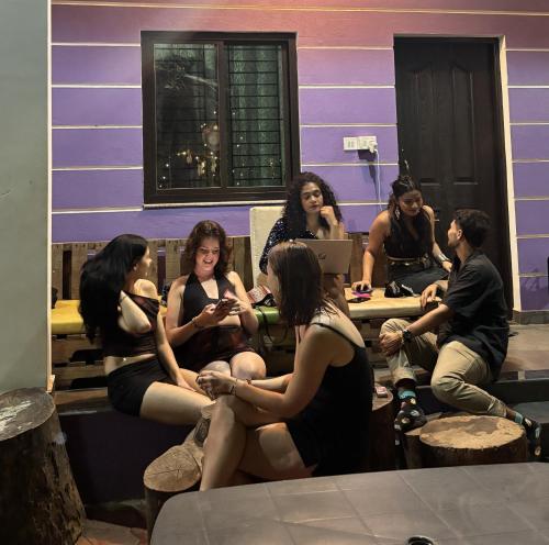 a group of women sitting around a table in a room at Tamasha Goa Vagator in Vagator