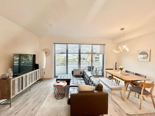 a living room with a couch and a table at Seahorse 316 in Sarasota