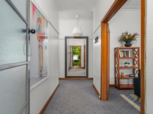 a hallway with a door leading into a house at Maison on Mair in Benalla