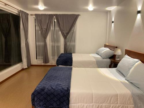Cama o camas de una habitación en Apricot Hotel