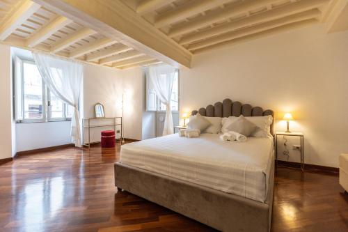 Ένα ή περισσότερα κρεβάτια σε δωμάτιο στο Piazza Navona Classy & Large Apartment