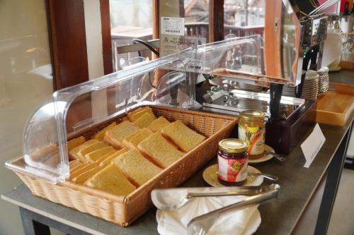 a basket of bread sitting on top of a counter at Parama Bromo Hotel in Ngadisari