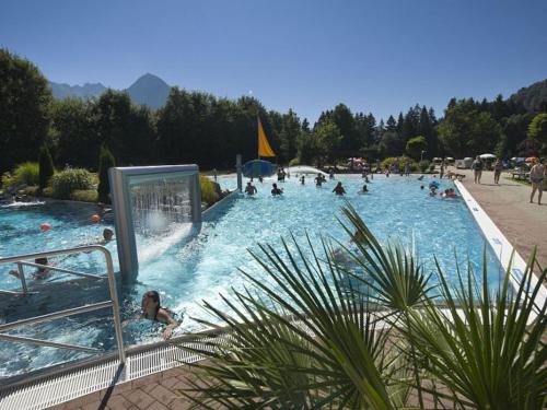 a group of people in a swimming pool at Haus Aigner in Fischen
