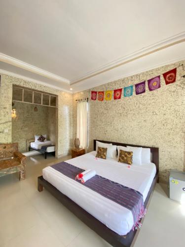 Cama o camas de una habitación en Baliwid Villa Ubud