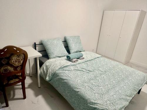 Ένα ή περισσότερα κρεβάτια σε δωμάτιο στο super chambre