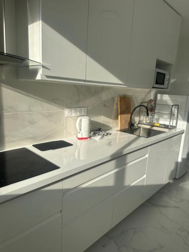 Kuchyň nebo kuchyňský kout v ubytování super chambre