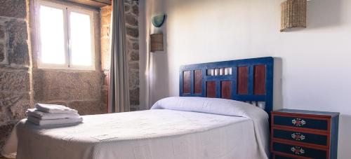 Ένα ή περισσότερα κρεβάτια σε δωμάτιο στο Casa do Comediante