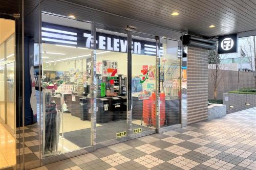a store front of a store with glass doors at Shinagawa Prince Hotel East Tower in Tokyo