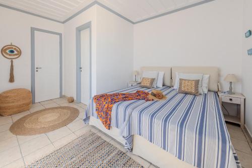 Katil atau katil-katil dalam bilik di The Villa Evita Stunning View with private pool