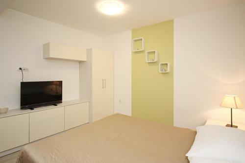 Posteľ alebo postele v izbe v ubytovaní House Gorica 2 - underground level apartments