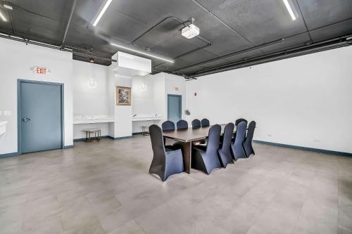 a conference room with a table and chairs in it at Radisson Hotel Schaumburg in Schaumburg