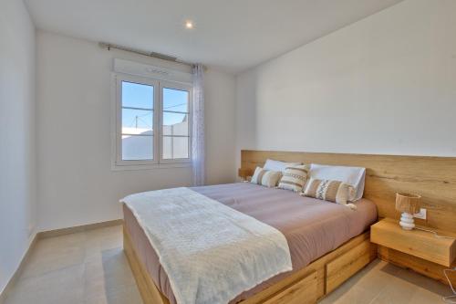 Giường trong phòng chung tại Maison Corail 2 - Au coeur de l'ile d'Oléron