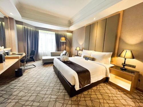 Кровать или кровати в номере The Pearl Kuala Lumpur