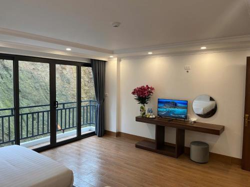 TV a/nebo společenská místnost v ubytování Sapa Warm Hotel