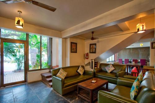 Resort Martins Siesta , A Portuguese Heritage Resort in Calanguteにあるシーティングエリア