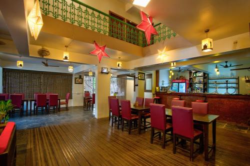 Resort Martins Siesta , A Portuguese Heritage Resort in Calanguteにあるレストランまたは飲食店