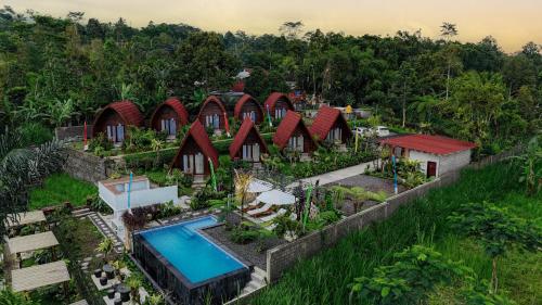 an aerial view of a resort with a swimming pool at The Hidden Valley in Besakih