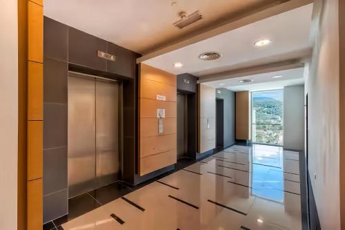 a hallway with a view of a building at 118 Island Plaza Penang in Tanjong Tokong