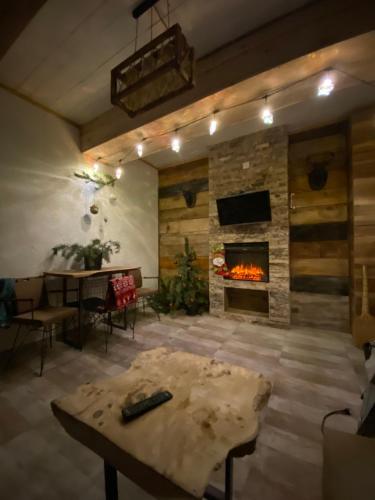 TV a/nebo společenská místnost v ubytování Chalet Bakuriani