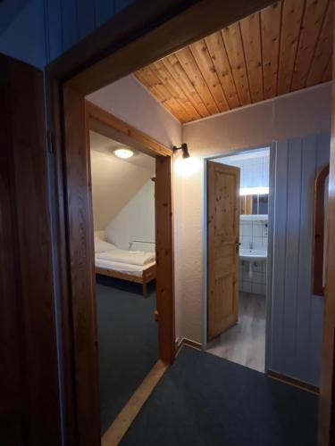 Postel nebo postele na pokoji v ubytování Hotel Mühleneck