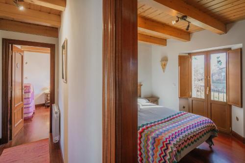 Postel nebo postele na pokoji v ubytování La Cabaña