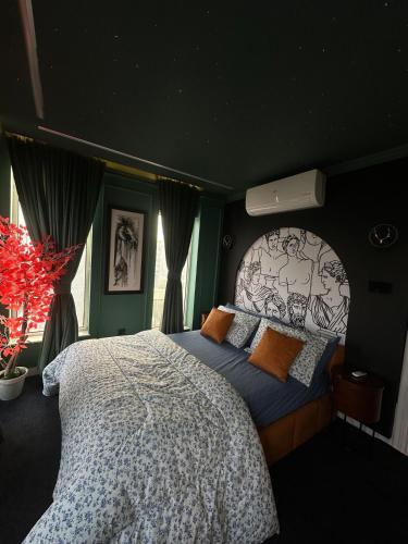 a bedroom with a large bed in a room at Luxury Elite Apartment with Exclusive Views in Lahore