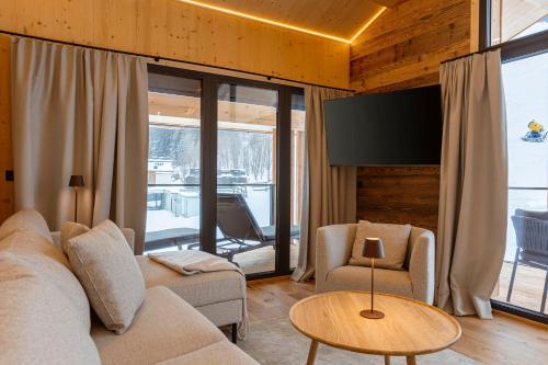 Posezení v ubytování Saalbach Suites by ALPS RESORTS