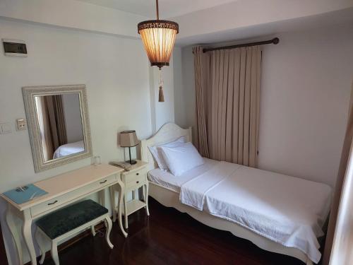 Letto o letti in una camera di Ferahi Evler Ayvalık
